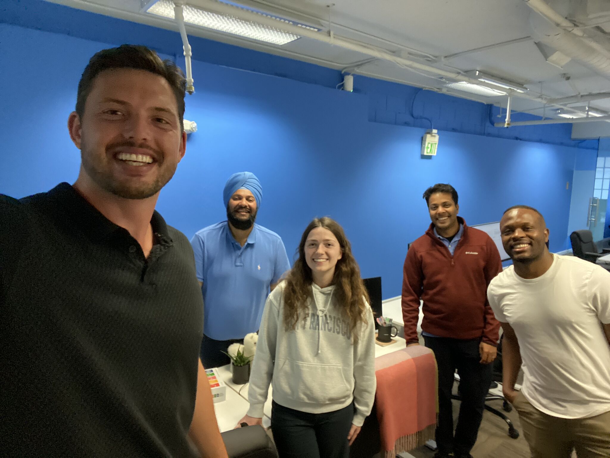 Dylan Raphael with the ProductNow founder and founding engineers